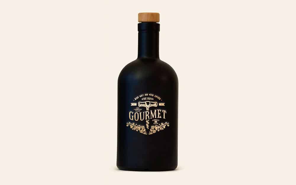 Matte black glass bottle with gold decal